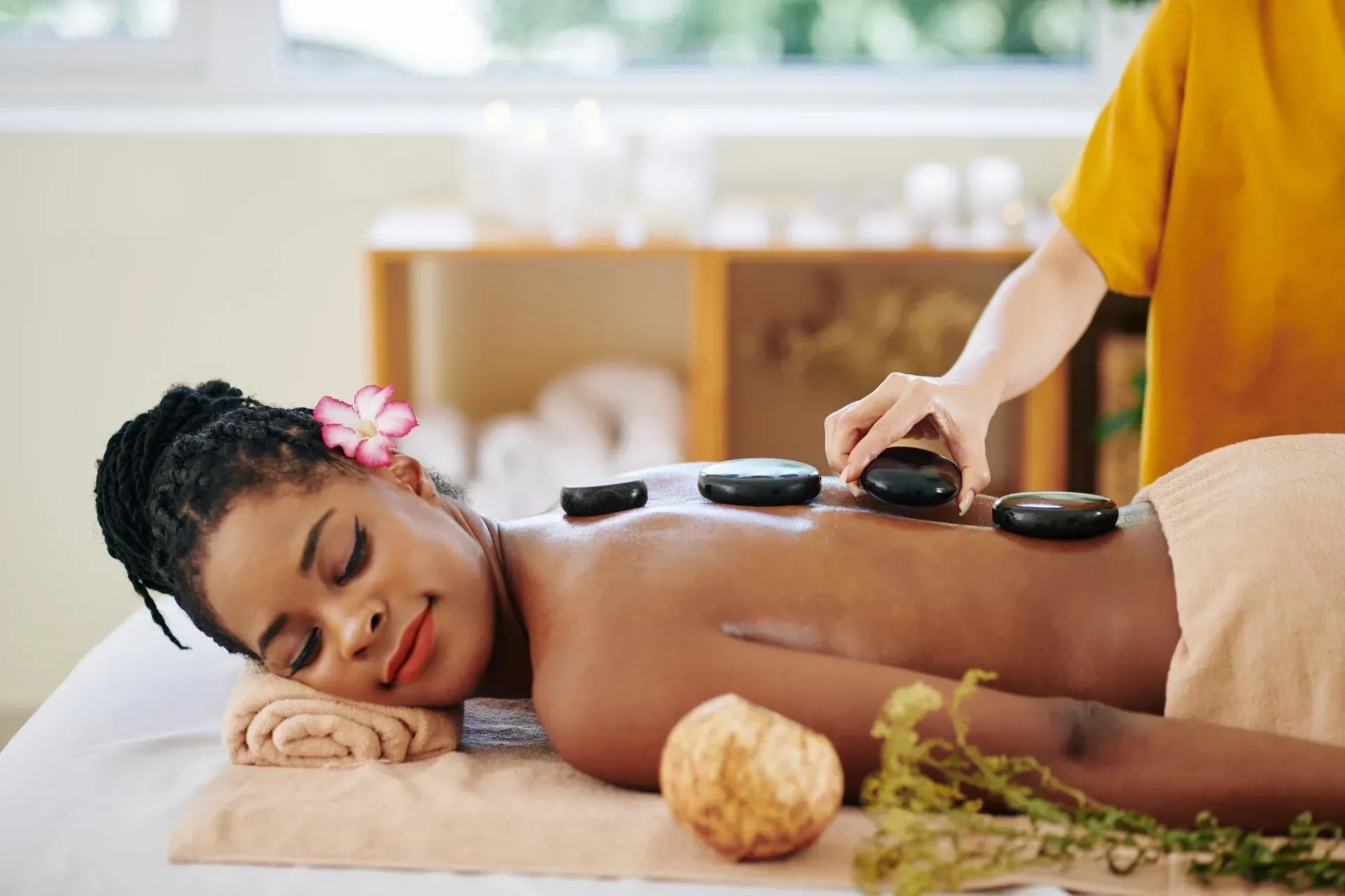 Woman enjoying hot stone massage