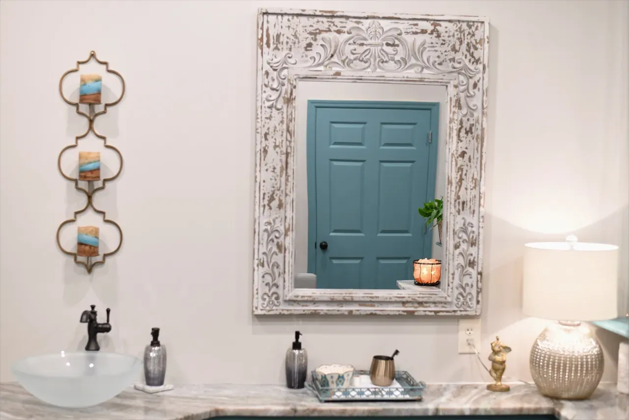 Bathroom vanity with decorative mirror